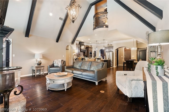 living room featuring beamed ceiling, dark hardwood / wood-style flooring, high vaulted ceiling, and an inviting chandelier