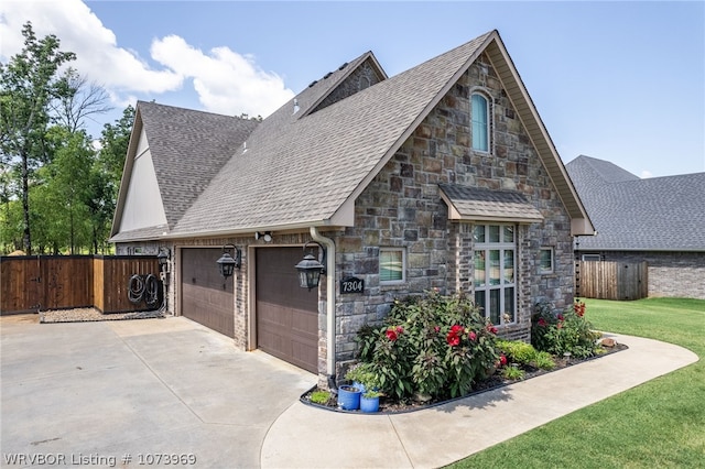 view of front of home with a garage