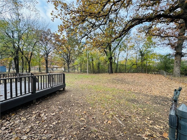 view of yard with a deck