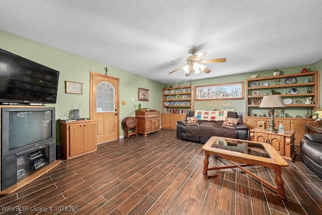 living room featuring a textured ceiling