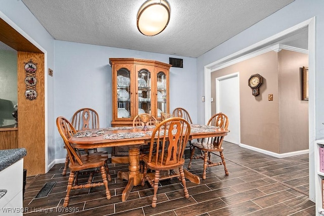 dining area with a textured ceiling