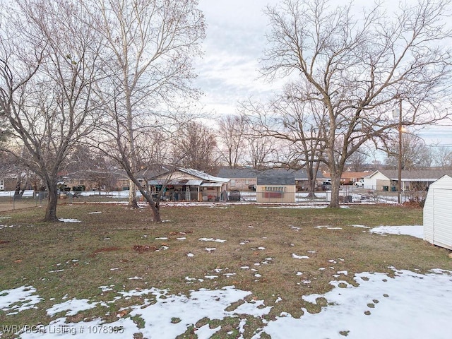 view of yard covered in snow