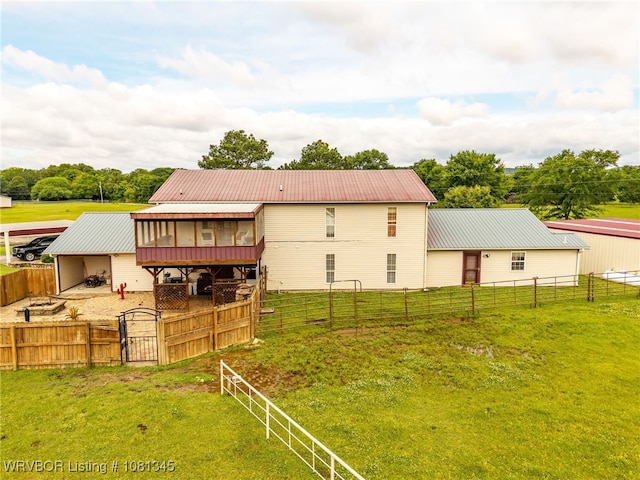 461510 E 1130th Rd, Sallisaw, OK 74955 - rear view of house featuring an exterior structure, metal roof, and an outbuilding