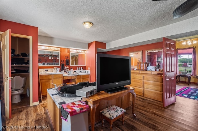 461510 E 1130th Rd, Sallisaw, OK 74955 - living area featuring wood finished floors and a textured ceiling