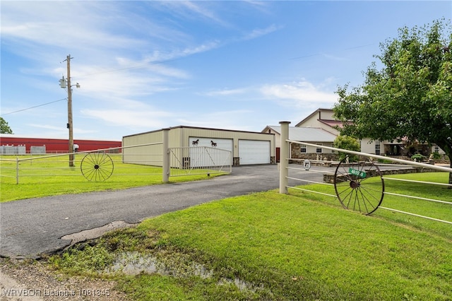 461510 E 1130th Rd, Sallisaw, OK 74955 - view of front of property featuring an outbuilding and a garage