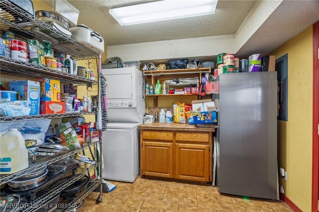 461510 E 1130th Rd, Sallisaw, OK 74955 - storage area featuring stacked washer / drying machine