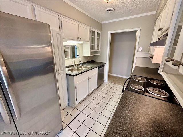 1414 12th Cir, Barling, AR 72923 - kitchen with appliances with stainless steel finishes, white cabinets, under cabinet range hood, glass insert cabinets, and a textured ceiling
