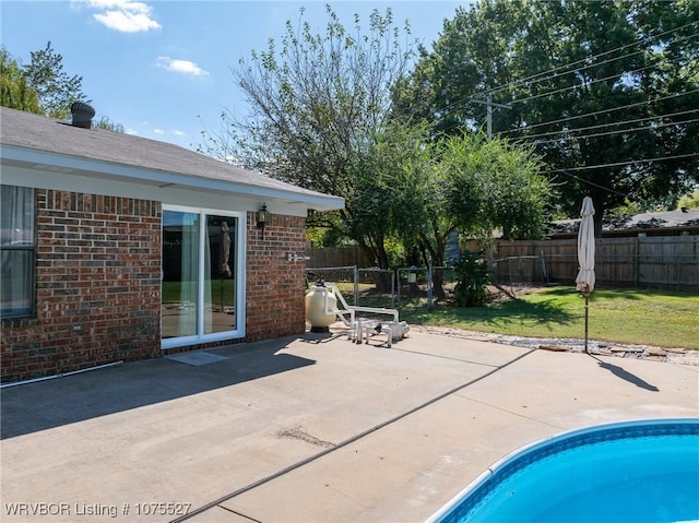 1414 12th Cir, Barling, AR 72923 - view of swimming pool with a fenced backyard and a patio