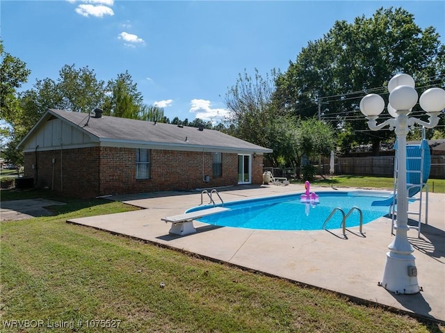 1414 12th Cir, Barling, AR 72923 - view of pool with a diving board and a patio area