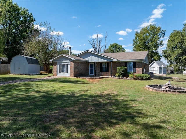 1414 12th Cir, Barling, AR 72923 - ranch-style home featuring brick siding and a storage shed