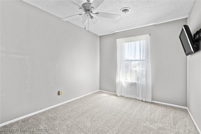 1414 12th Cir, Barling, AR 72923 - spare room featuring a textured ceiling, carpet, and ceiling fan
