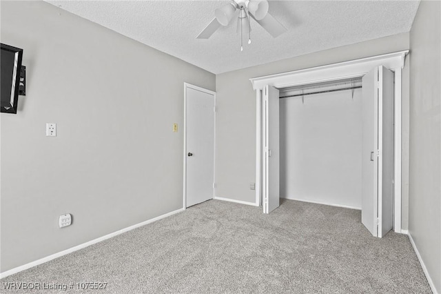 1414 12th Cir, Barling, AR 72923 - unfurnished bedroom with carpet floors, a textured ceiling, a ceiling fan, and a closet