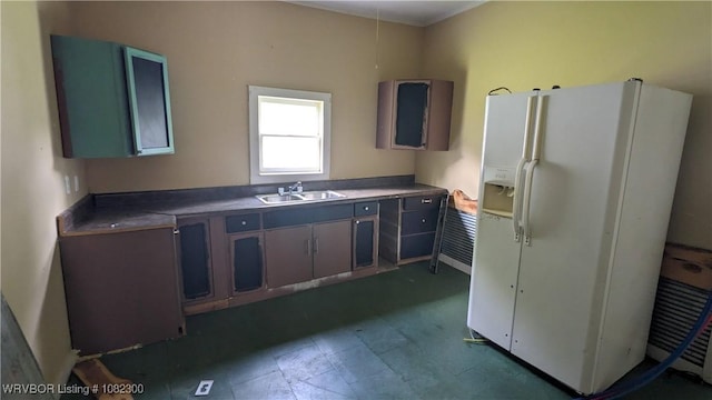 23 Church St, Charleston, AR 72933 - kitchen with white fridge with ice dispenser and a sink