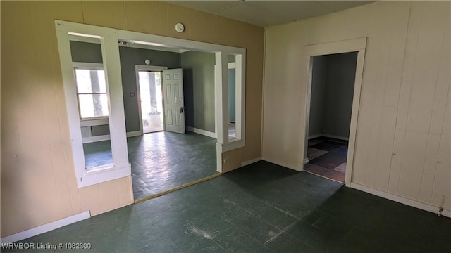 23 Church St, Charleston, AR 72933 - empty room with dark floors