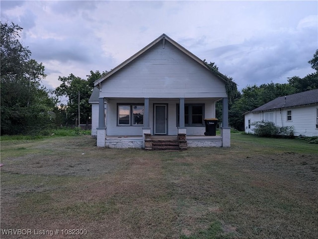 23 Church St, Charleston, AR 72933 - view of front of home with a front yard and covered porch