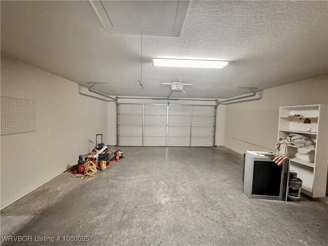199 Pecan Ln, Greenwood, AR 72936 - garage featuring a garage door opener