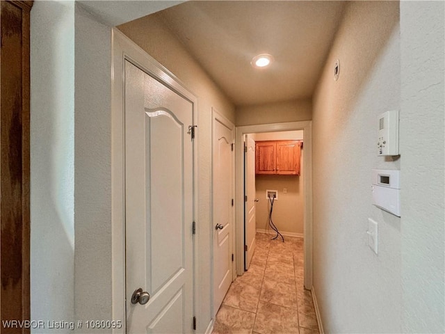 199 Pecan Ln, Greenwood, AR 72936 - hallway with light tile patterned flooring and baseboards