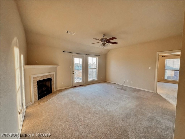 199 Pecan Ln, Greenwood, AR 72936 - unfurnished living room with a ceiling fan, visible vents, carpet floors, a tiled fireplace, and baseboards
