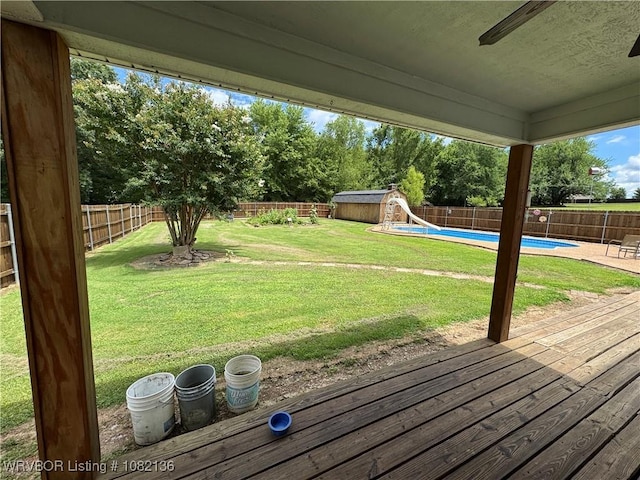 1721 Armistead Rd, Fort Smith, AR 72916 - wooden deck with a storage shed and a fenced backyard