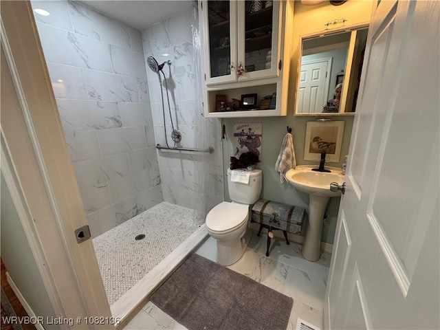 1721 Armistead Rd, Fort Smith, AR 72916 - bathroom featuring marble finish flooring and a tile shower