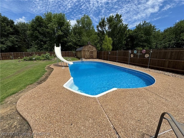 1721 Armistead Rd, Fort Smith, AR 72916 - view of pool featuring a water slide, a fenced backyard, a patio, a storage shed, and view of scattered trees