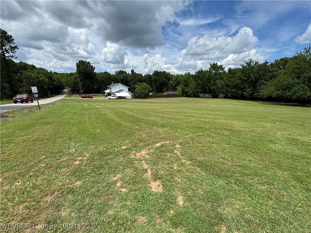1721 Armistead Rd, Fort Smith, AR 72916 - view of grassy yard featuring a forest view