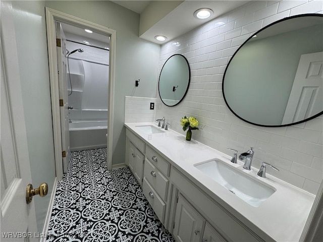 1721 Armistead Rd, Fort Smith, AR 72916 - full bathroom with double vanity, decorative backsplash, tile patterned flooring, shower / washtub combination, and recessed lighting