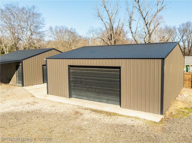 view of outbuilding with a garage