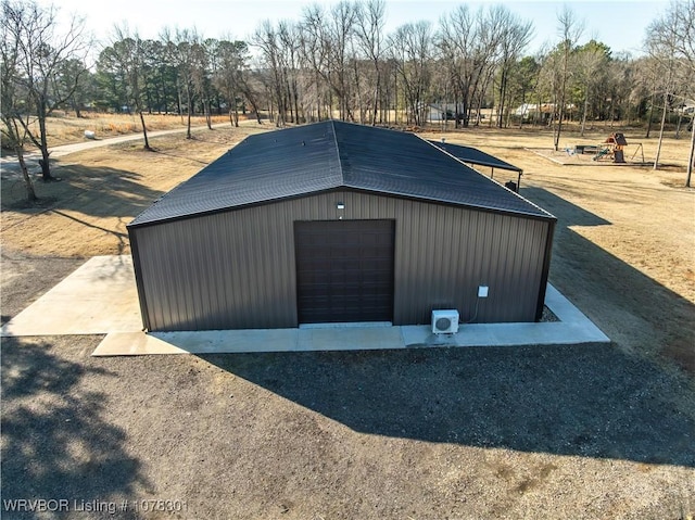 view of outbuilding with a garage