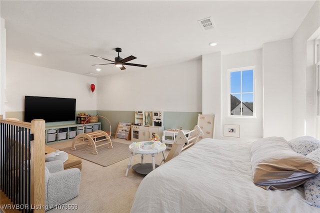 carpeted bedroom featuring recessed lighting, visible vents, and ceiling fan