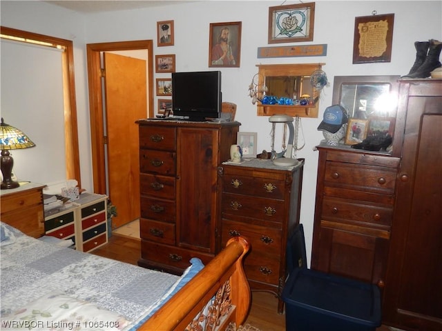 bedroom with light wood-type flooring