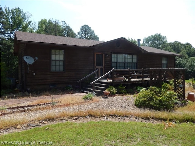 view of front of property with a deck