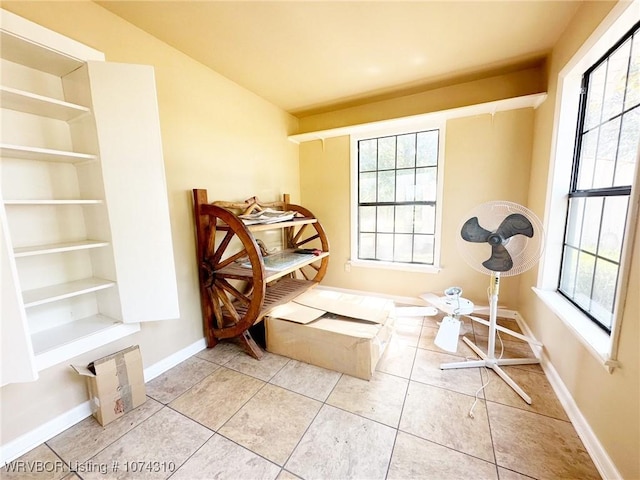 living area featuring light tile patterned floors