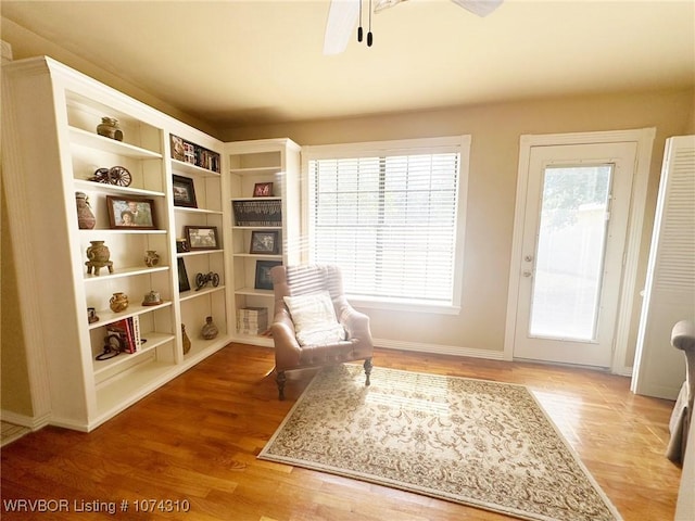 unfurnished room featuring ceiling fan and wood-type flooring