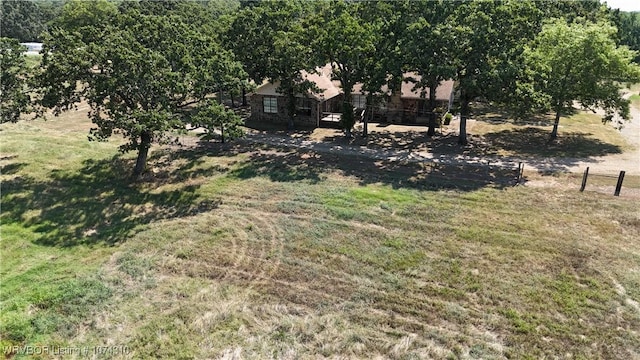 view of yard with a rural view