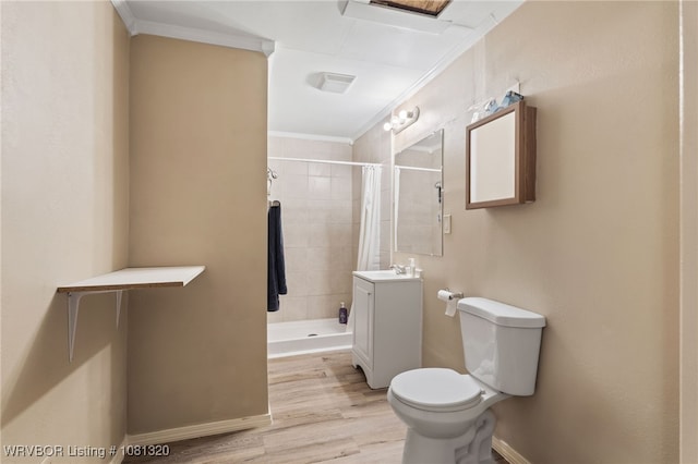 1501 S R St, Fort Smith, AR 72901 - full bathroom featuring toilet, crown molding, tiled shower, wood finished floors, and vanity