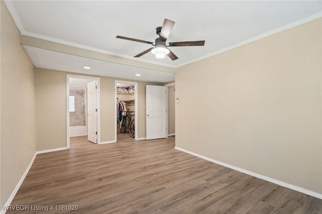 1501 S R St, Fort Smith, AR 72901 - empty room featuring ceiling fan, light wood-style floors, baseboards, ornamental molding, and recessed lighting