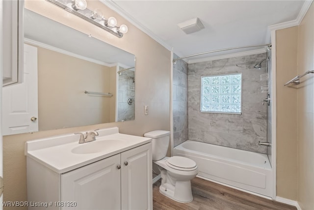 1501 S R St, Fort Smith, AR 72901 - full bath with crown molding, wood finished floors, vanity, toilet, and washtub / shower combination