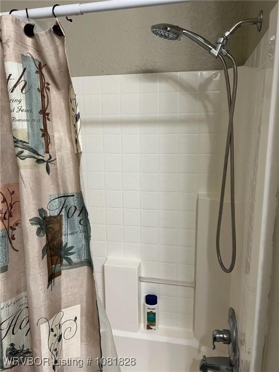 1610 Tiger Lily Ct, Greenwood, AR 72936 - bathroom featuring shower / bath combination with curtain