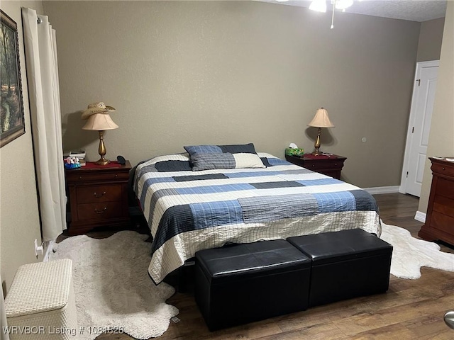 1610 Tiger Lily Ct, Greenwood, AR 72936 - bedroom featuring wood finished floors and baseboards