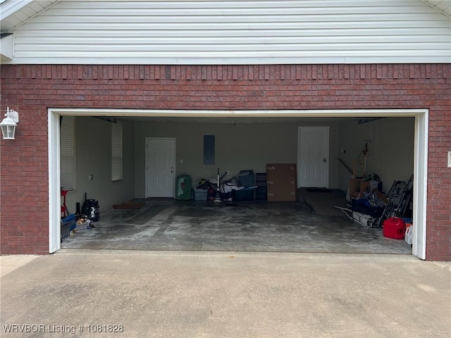1610 Tiger Lily Ct, Greenwood, AR 72936 - garage featuring concrete driveway and electric panel