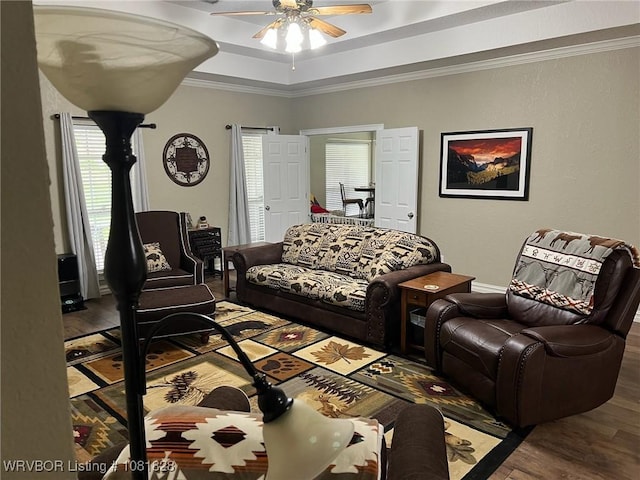 1610 Tiger Lily Ct, Greenwood, AR 72936 - living room with wood finished floors, ceiling fan, ornamental molding, and a raised ceiling
