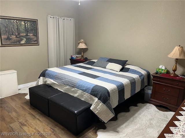 1610 Tiger Lily Ct, Greenwood, AR 72936 - bedroom with wood finished floors and baseboards