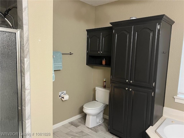 1610 Tiger Lily Ct, Greenwood, AR 72936 - bathroom featuring toilet and a shower stall
