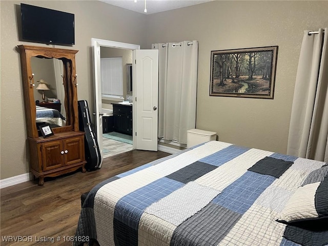 1610 Tiger Lily Ct, Greenwood, AR 72936 - bedroom featuring dark wood-style floors and ensuite bath