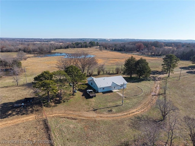 birds eye view of property featuring a rural view