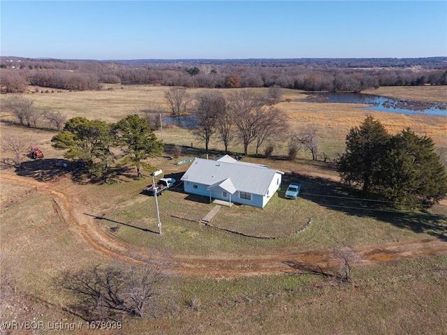 bird's eye view with a water view and a rural view