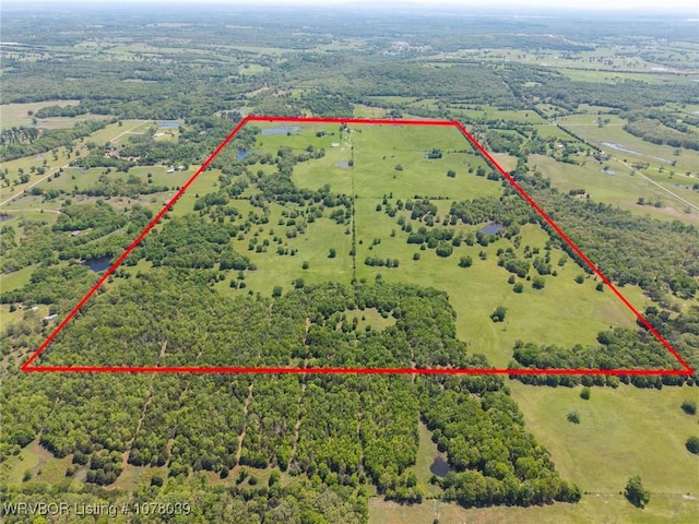 469517 E 1060th Rd, Muldrow, OK 74948 - birds eye view of property featuring a forest view