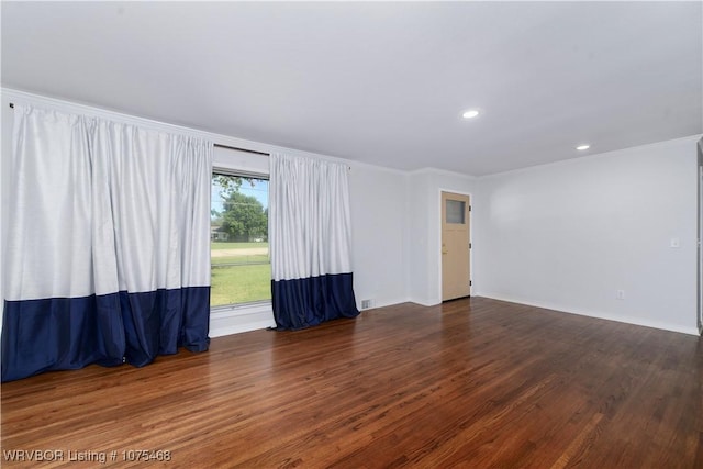 unfurnished room featuring dark hardwood / wood-style floors