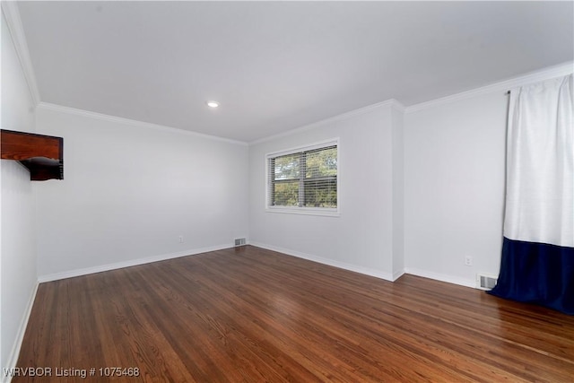 unfurnished room featuring dark hardwood / wood-style flooring and crown molding